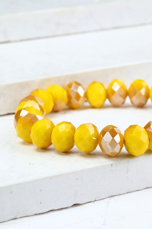 This is a photo of a Crystal Bead Bracelet in mustard.