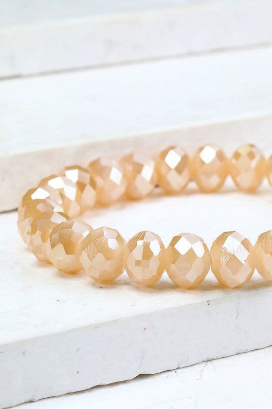 This is a photo of a Crystal Bead Bracelet in peach.